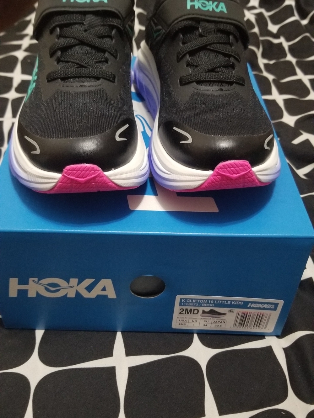 Hoka Kids Black Sneakers with Pink and Teal Accents